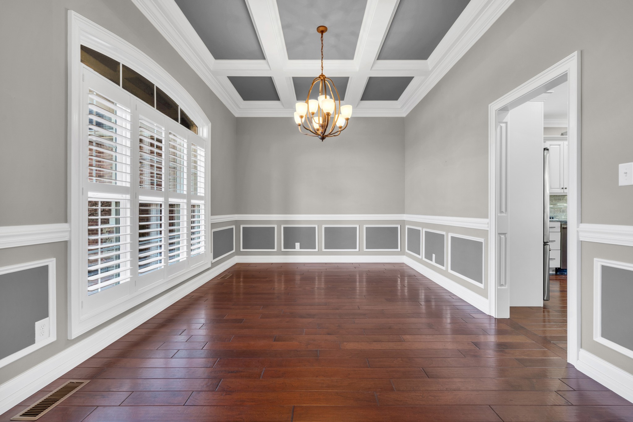 254 Gray Hawk Trail Clarksville, TN 37043 - Photo 4 of 29 a view of an empty room with wooden floor and a window