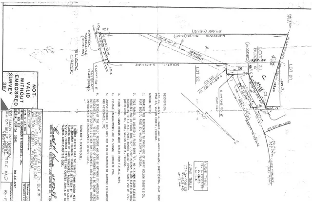 a picture of a bathroom with a shower