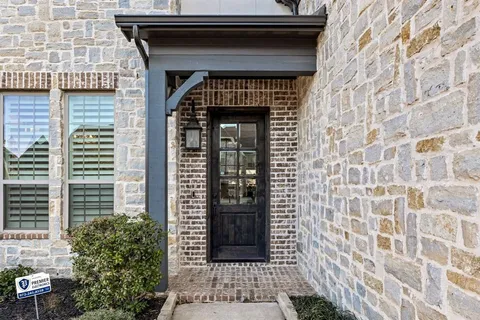 a front view of a house with a door