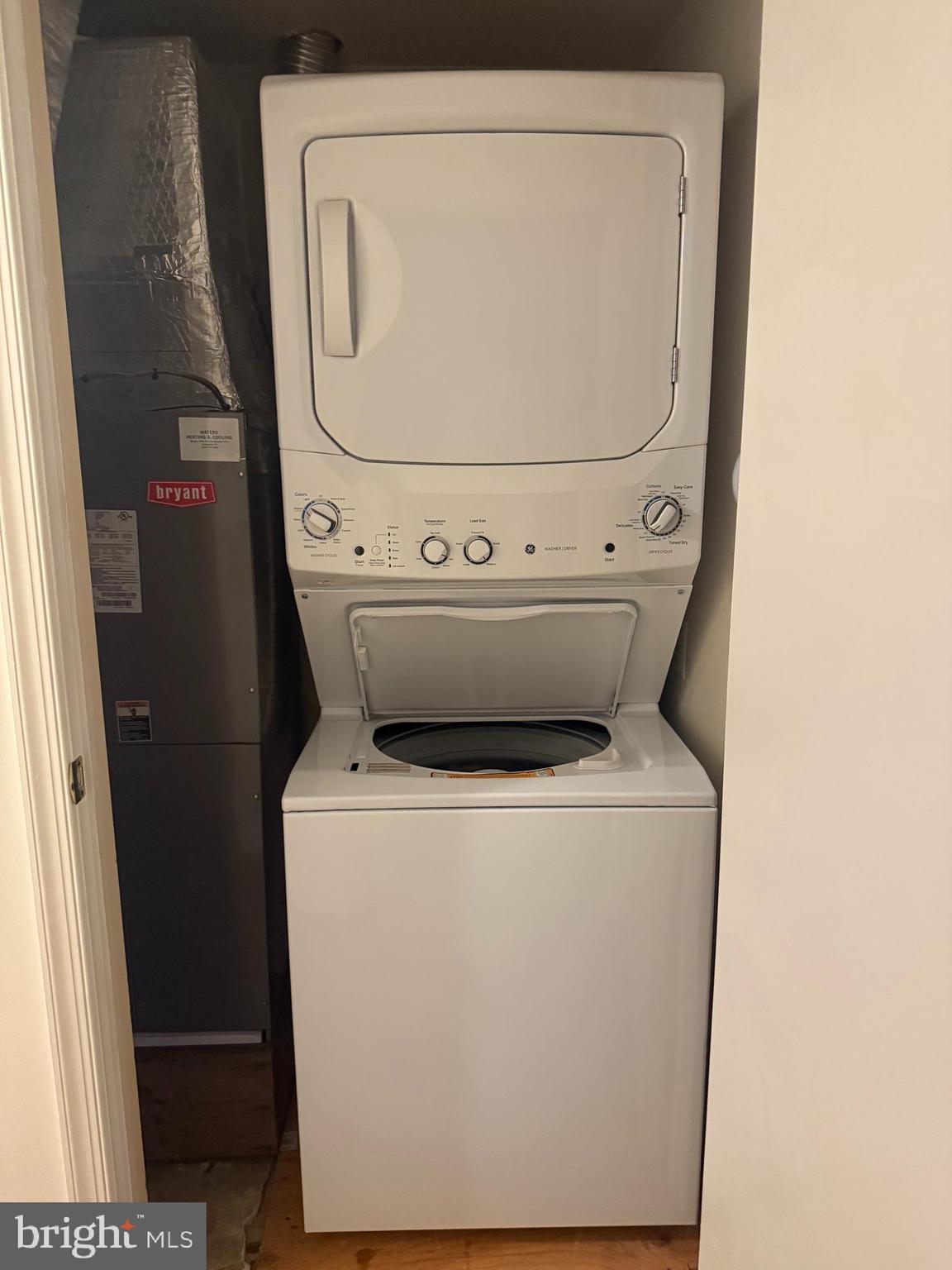 214 Christopher Place, Unit 214 Chalfont, PA 18914 - Photo 17 of 27 a utility room with dryer and washer