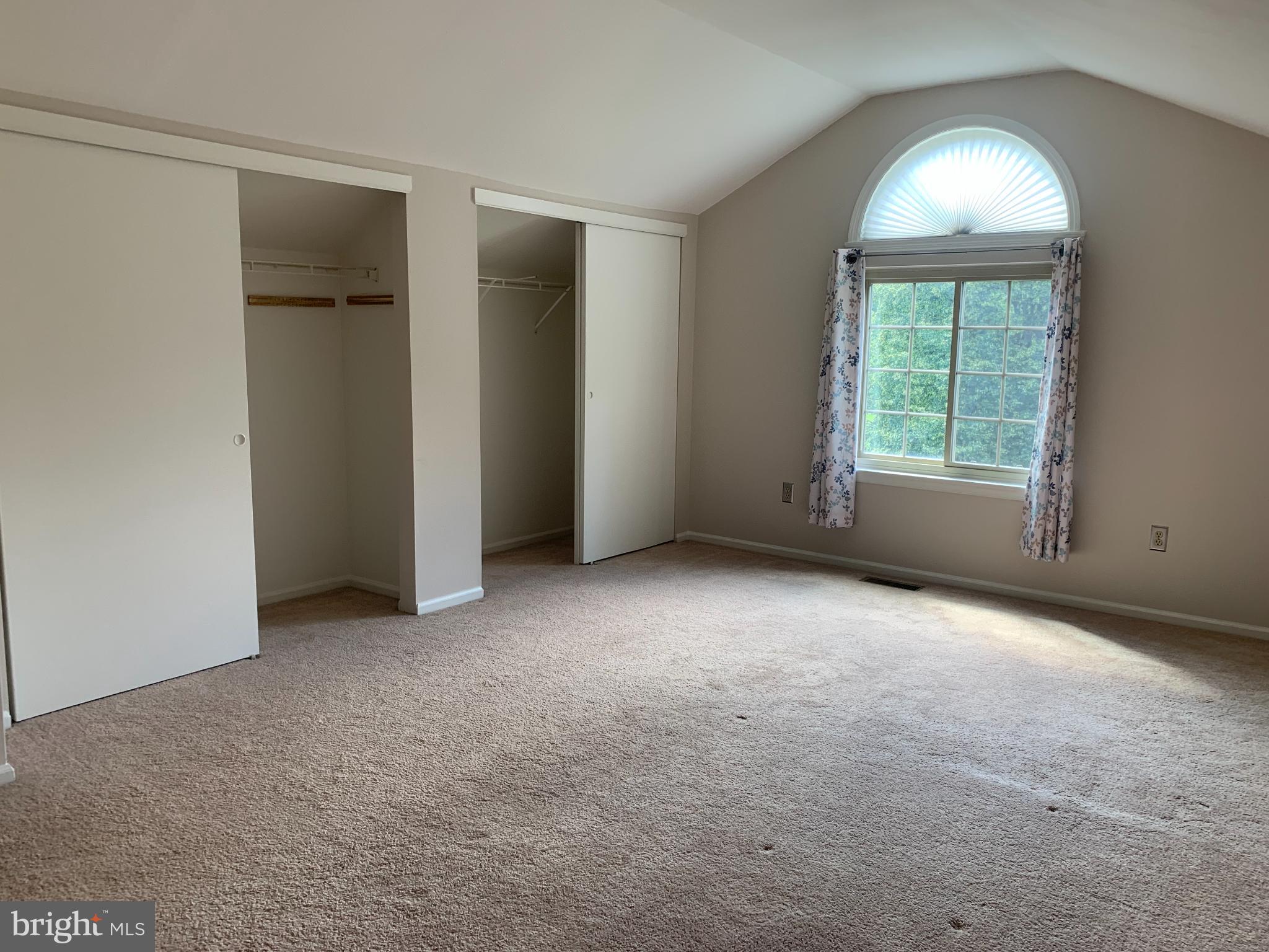 214 Christopher Place, Unit 214 Chalfont, PA 18914 - Photo 23 of 27 an empty room that has a window