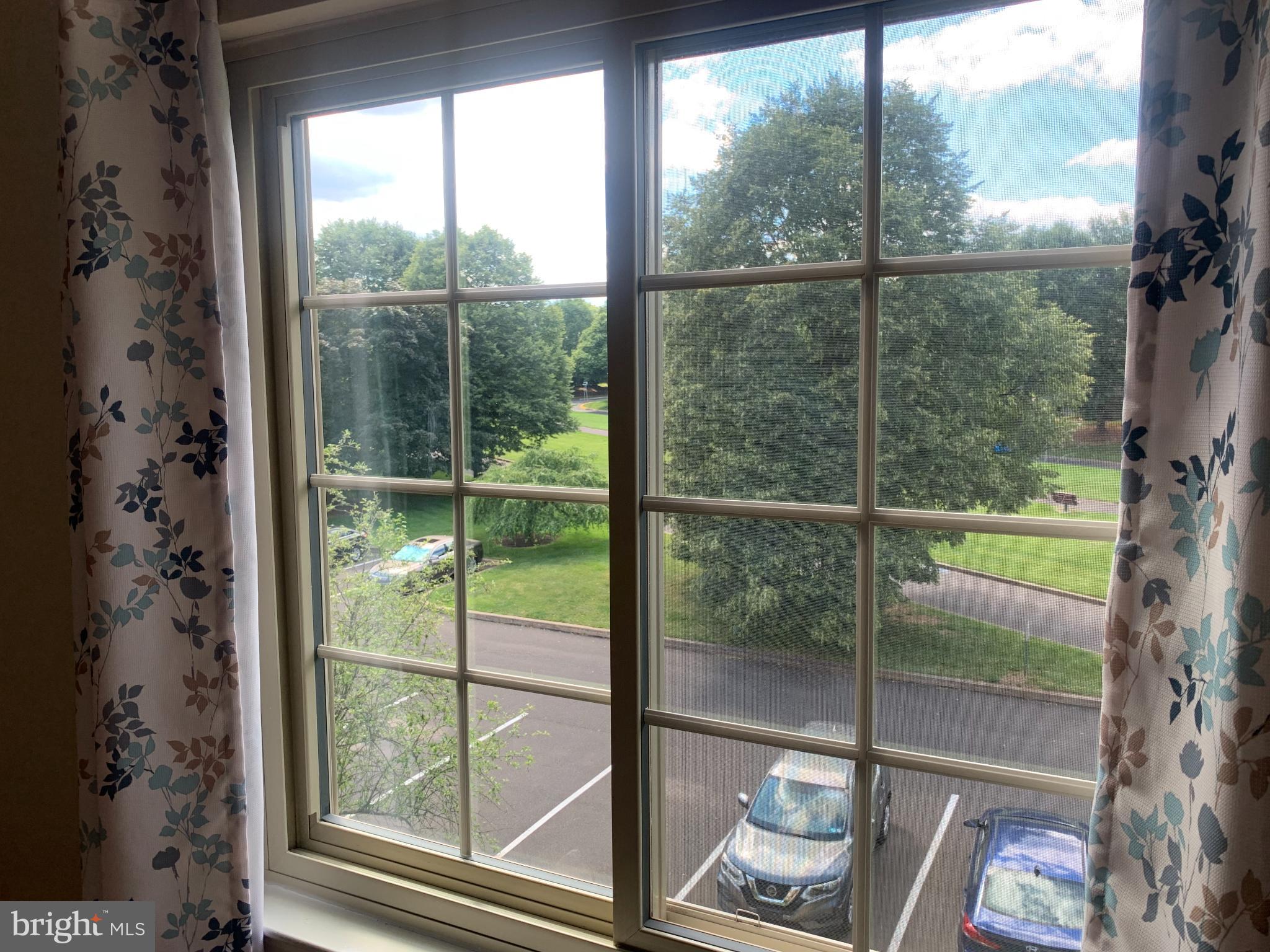 214 Christopher Place, Unit 214 Chalfont, PA 18914 - Photo 25 of 27 a view of a glass door