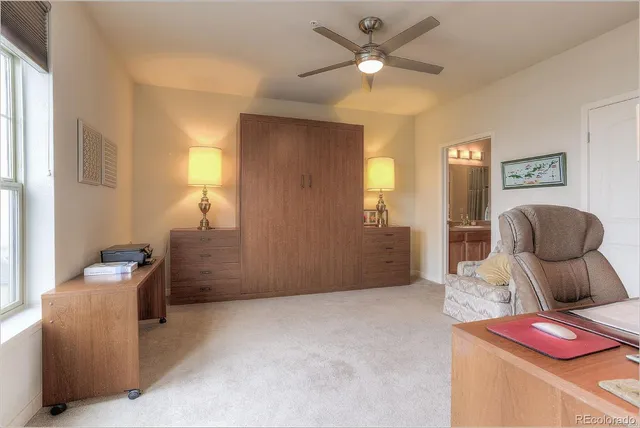 a livingroom with furniture and window