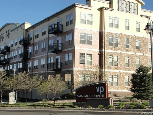 a front view of a building with street view