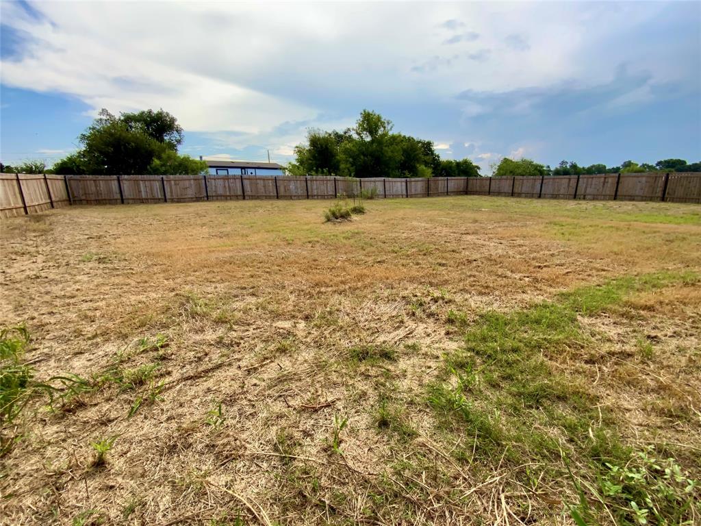 607 Faulkenberry Road Groesbeck, TX 76642 - Photo 38 of 40 a view of outdoor space with swimming pool and trees in the background