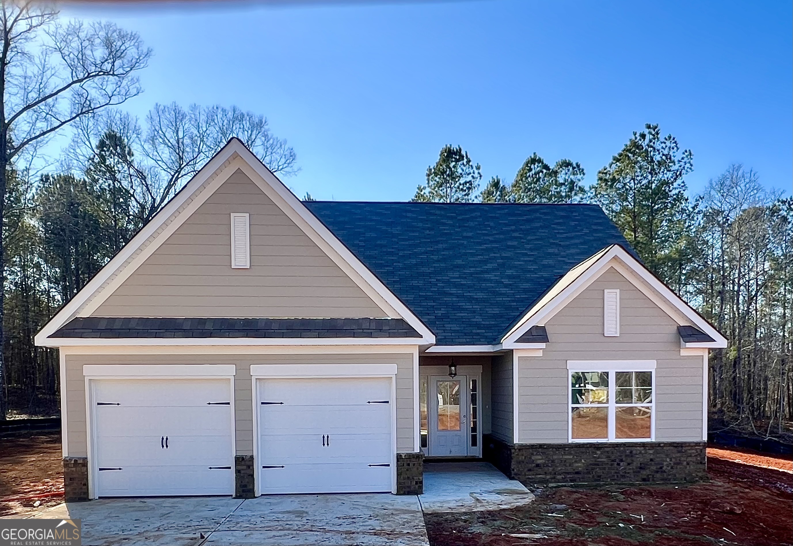 67 Sydney Court, Unit 44 Mansfield, GA 30055 - Photo 1 of 30 a front view of a house with a yard