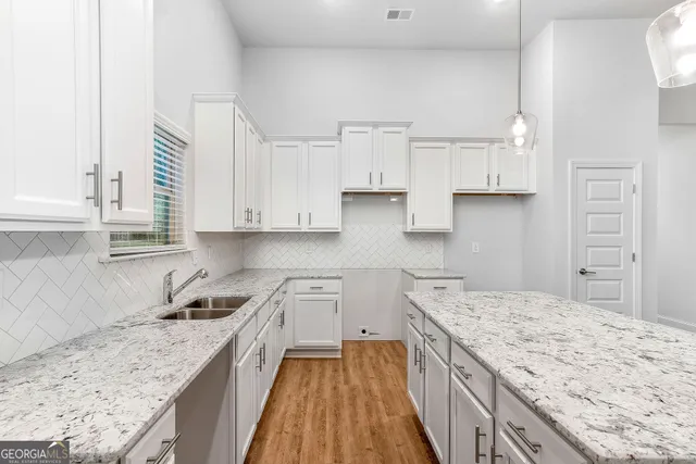 a view of a sink and dishwasher