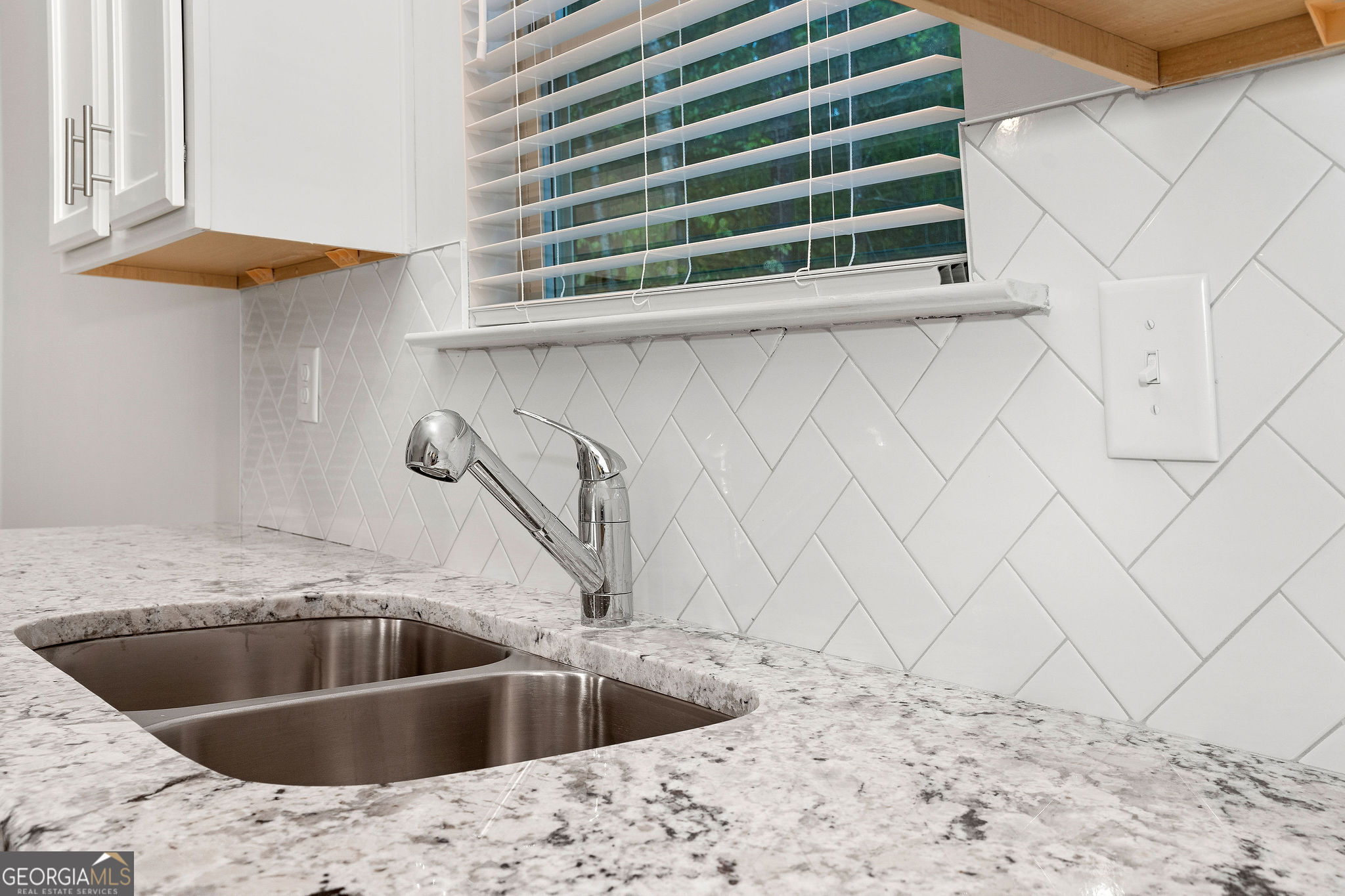 67 Sydney Court, Unit 44 Mansfield, GA 30055 - Photo 15 of 30 a view of a sink and dishwasher