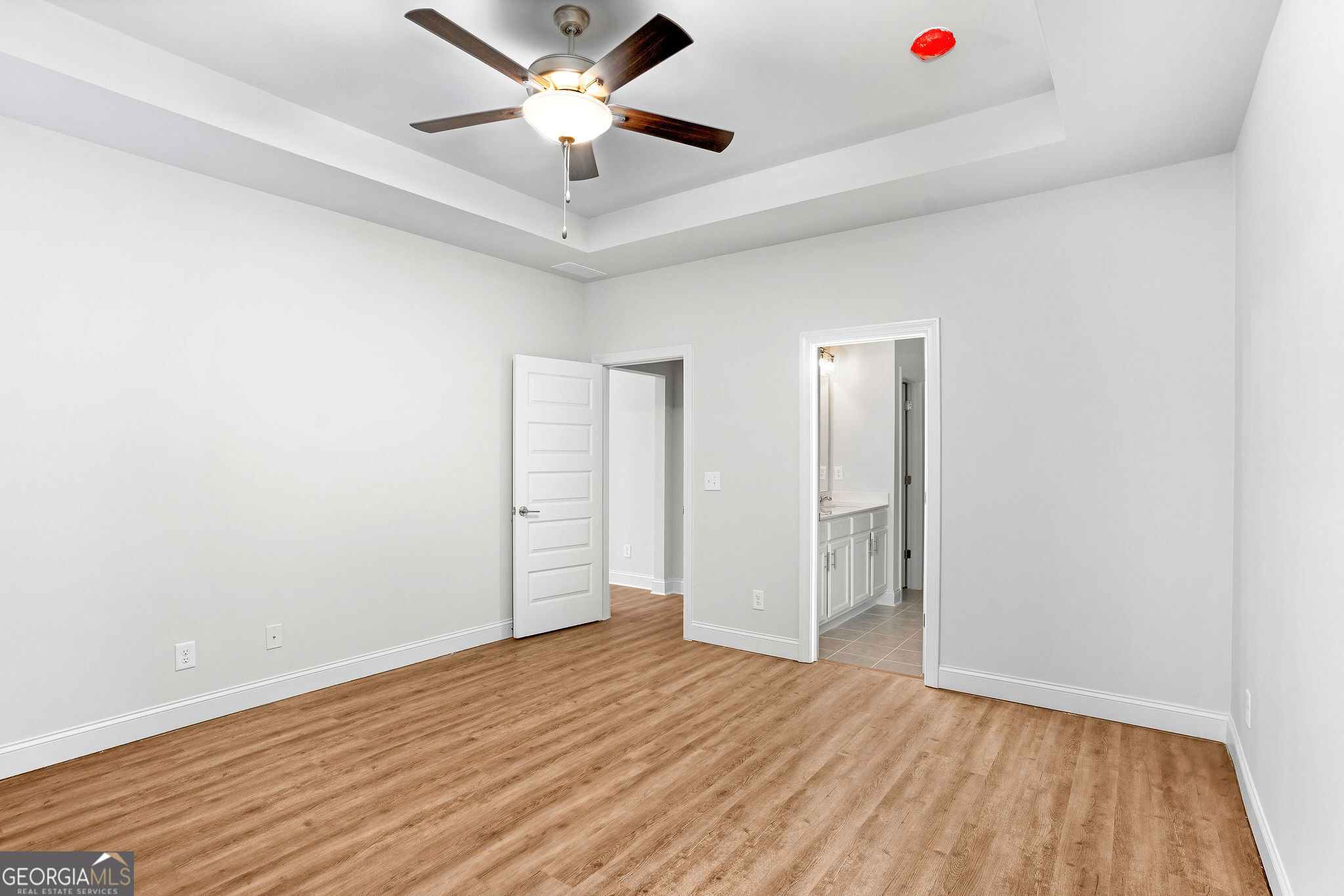 67 Sydney Court, Unit 44 Mansfield, GA 30055 - Photo 21 of 30 wooden floor in an empty room