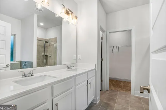 an empty room with closet area