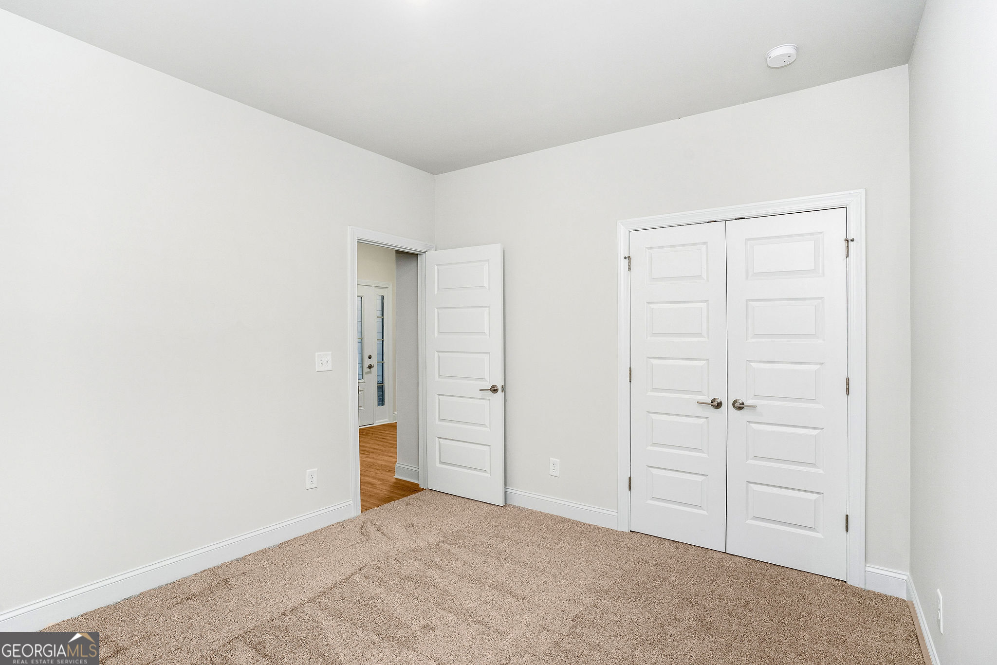 67 Sydney Court, Unit 44 Mansfield, GA 30055 - Photo 25 of 30 an empty room with closet area
