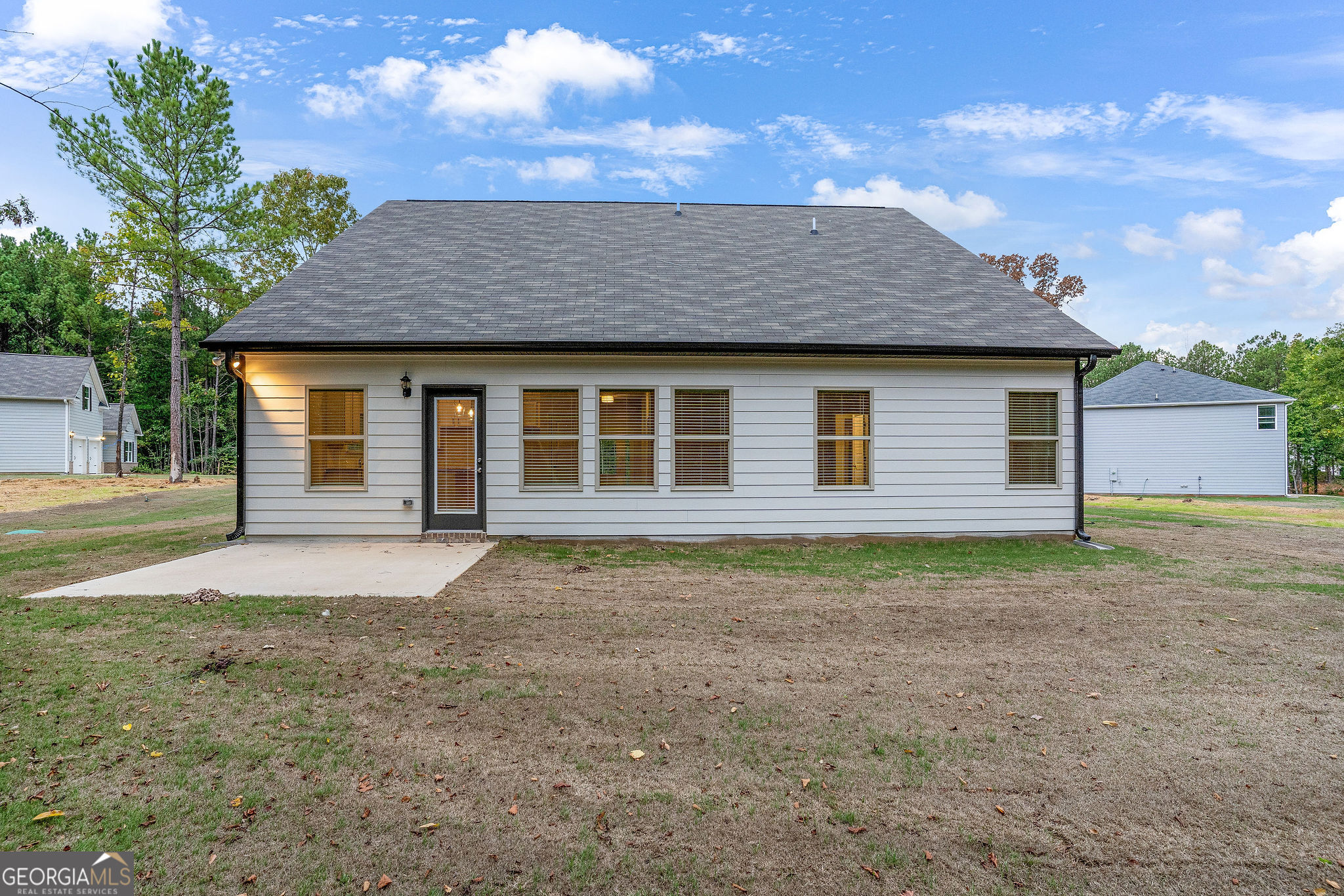 67 Sydney Court, Unit 44 Mansfield, GA 30055 - Photo 28 of 30 a house with yard space