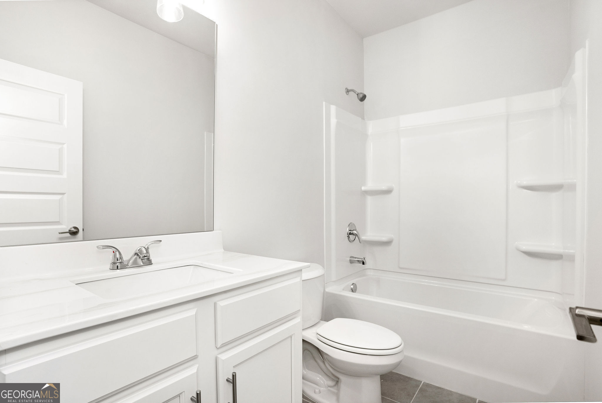 67 Sydney Court, Unit 44 Mansfield, GA 30055 - Photo 8 of 30 a bathroom with a sink toilet vanity and shower