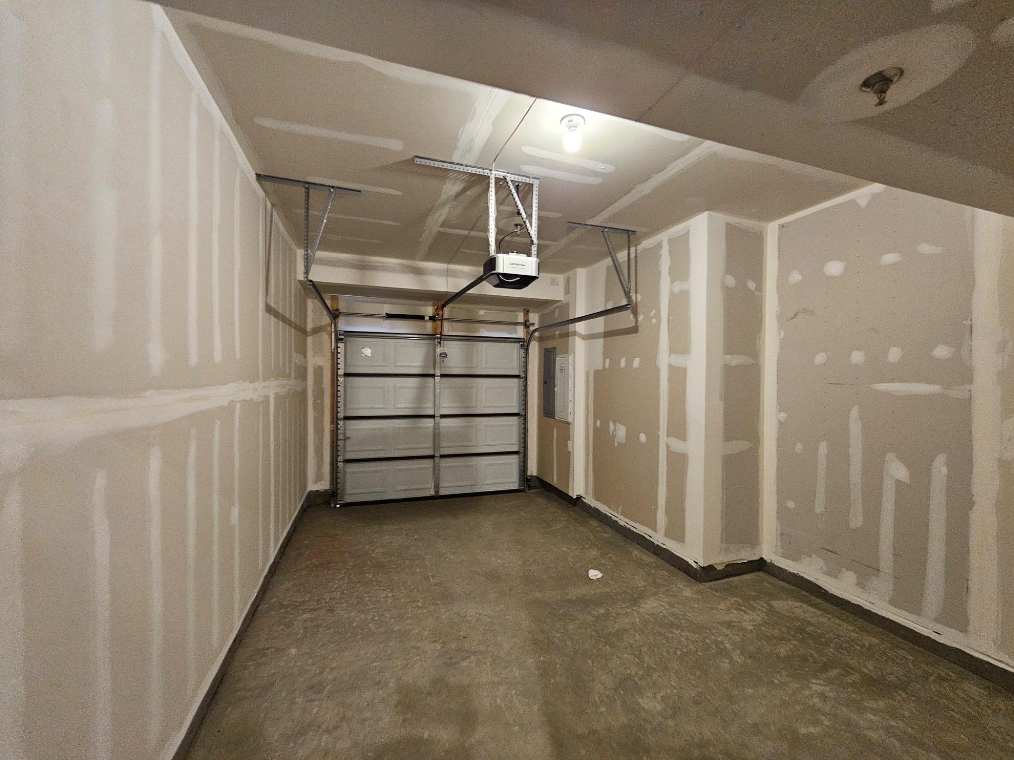 13721 Cobble Loop Woodbridge, VA 22193 - Photo 25 of 27 One car garage with remote.