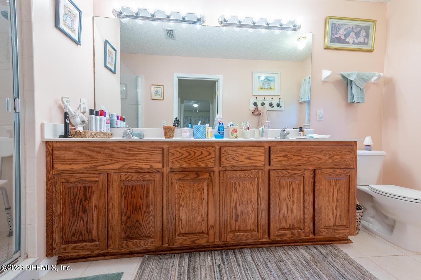 2879 Longleaf Ranch Circle Middleburg, FL 32068 - Photo 18 of 56 Master bathroom in the first living are