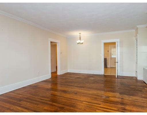 71 Marsden Street Springfield, MA 01109 - Photo 11 of 23 a view of an empty room with wooden floor
