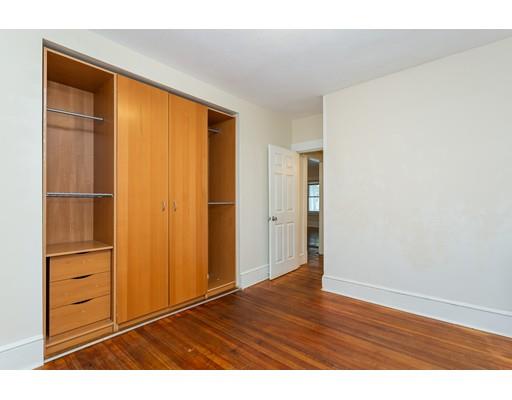 71 Marsden Street Springfield, MA 01109 - Photo 18 of 23 a view of an empty room with wooden floor