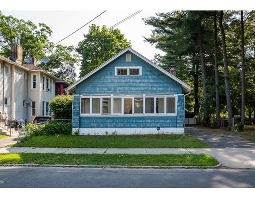 71 Marsden Street Springfield, MA 01109 - Photo 2 of 23 a front view of a house with a yard
