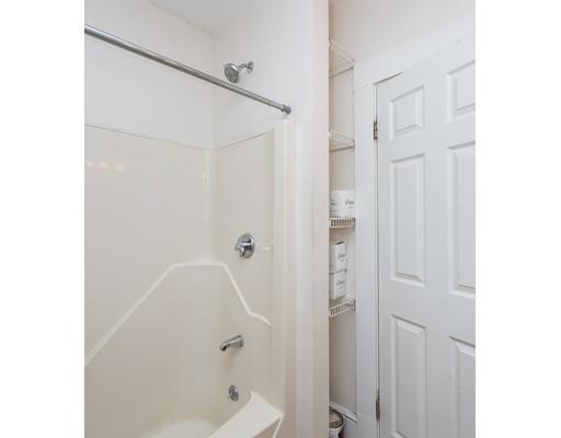 71 Marsden Street Springfield, MA 01109 - Photo 23 of 23 a bathroom with a shower and a glass door