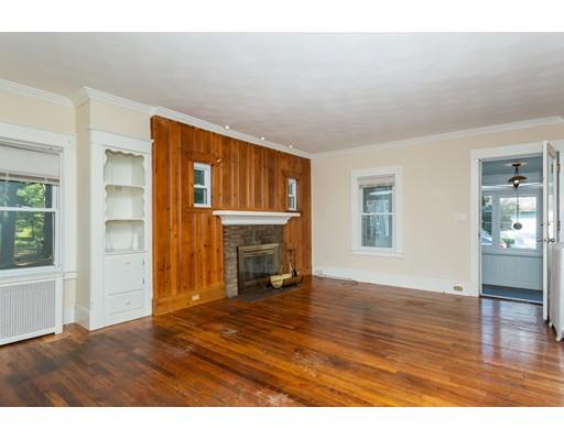 71 Marsden Street Springfield, MA 01109 - Photo 9 of 23 a view of an empty room with window and wooden floor
