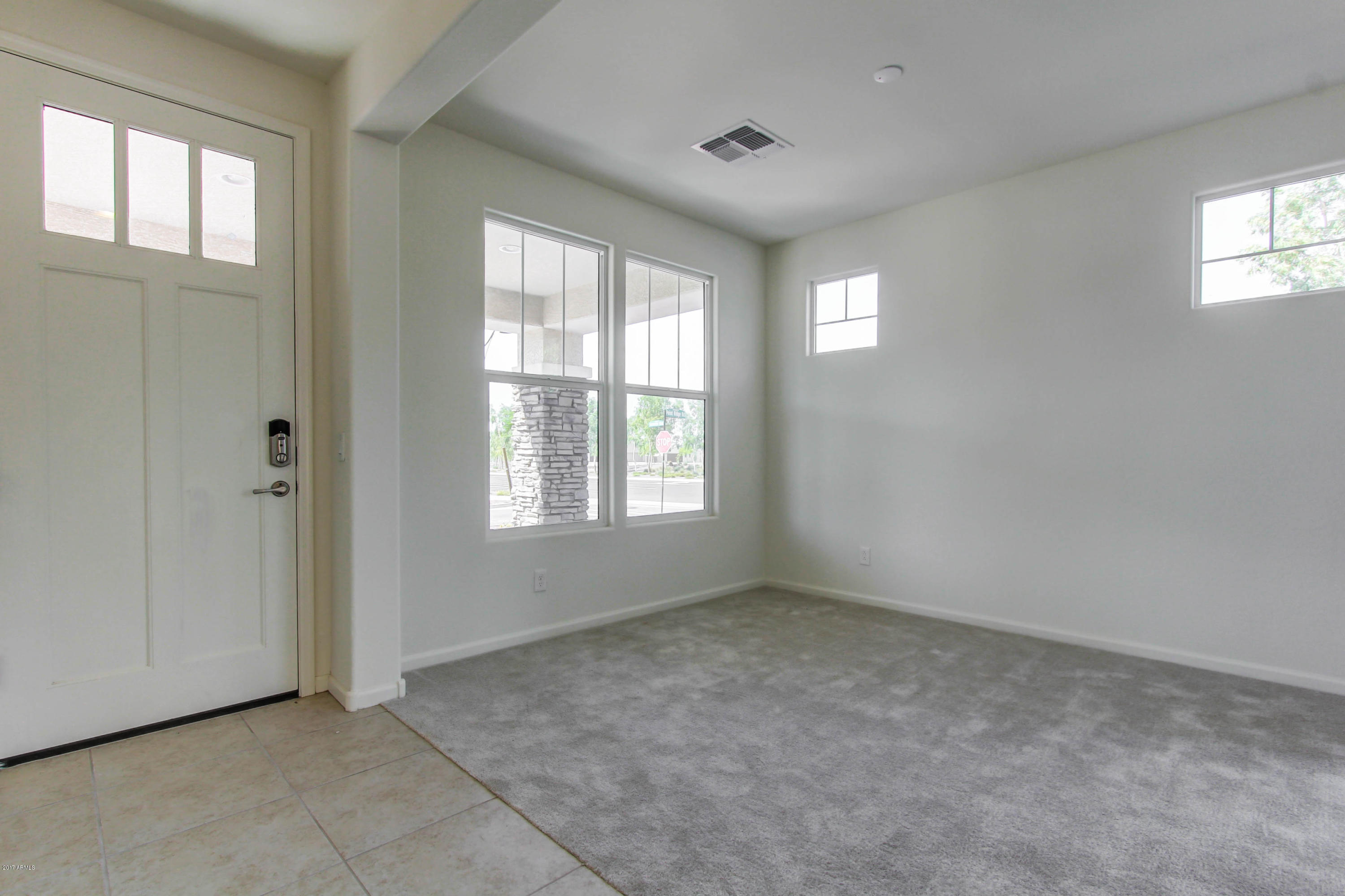 20668 West Point Ridge Road Buckeye, AZ 85396 - Photo 2 of 15 002_Foyer and Flex Room