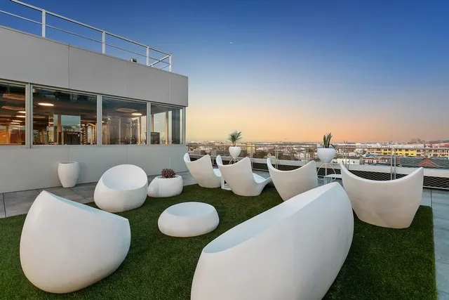 a view of a patio in the backyard