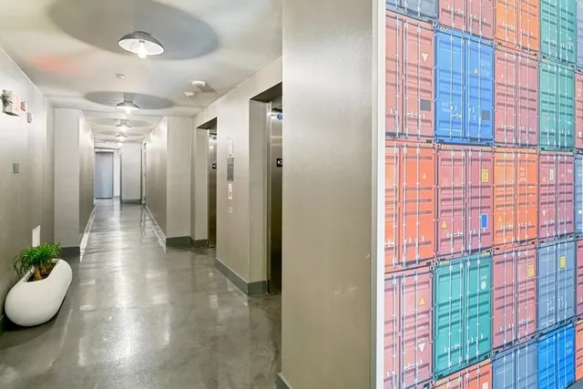 a view of a hallway and dining room