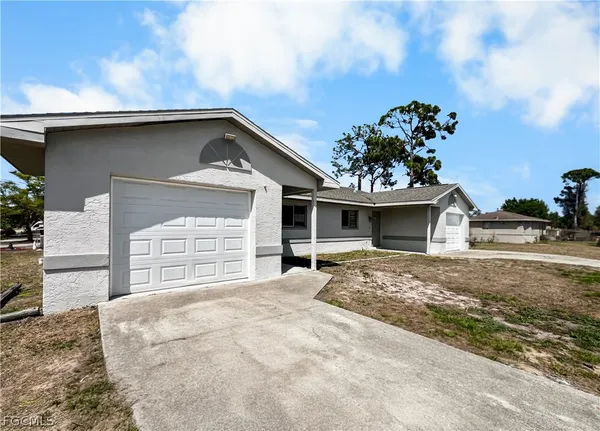 $1,449 | 2704 Owen Avenue South, Lehigh Acres, FL 33973