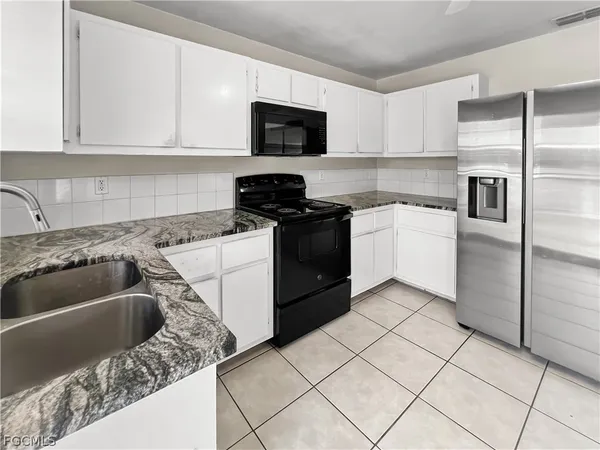 $1,449 | 2704 Owen Avenue South, Lehigh Acres, FL 33973