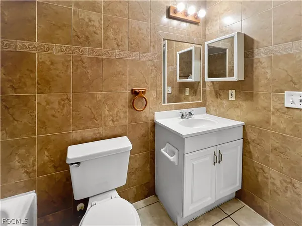 $1,449 | 2704 Owen Avenue South, Lehigh Acres, FL 33973