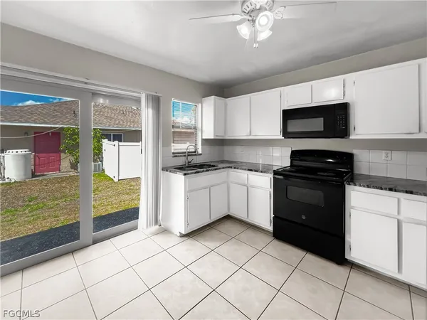 $1,449 | 2704 Owen Avenue South, Lehigh Acres, FL 33973