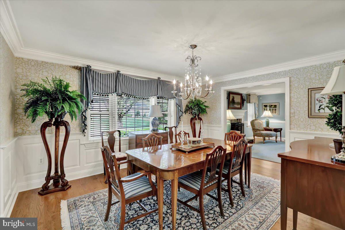 2 Cardinal Road Wyomissing, PA 19610 - Photo 11 of 51 a view of a dining room with furniture and chandelier