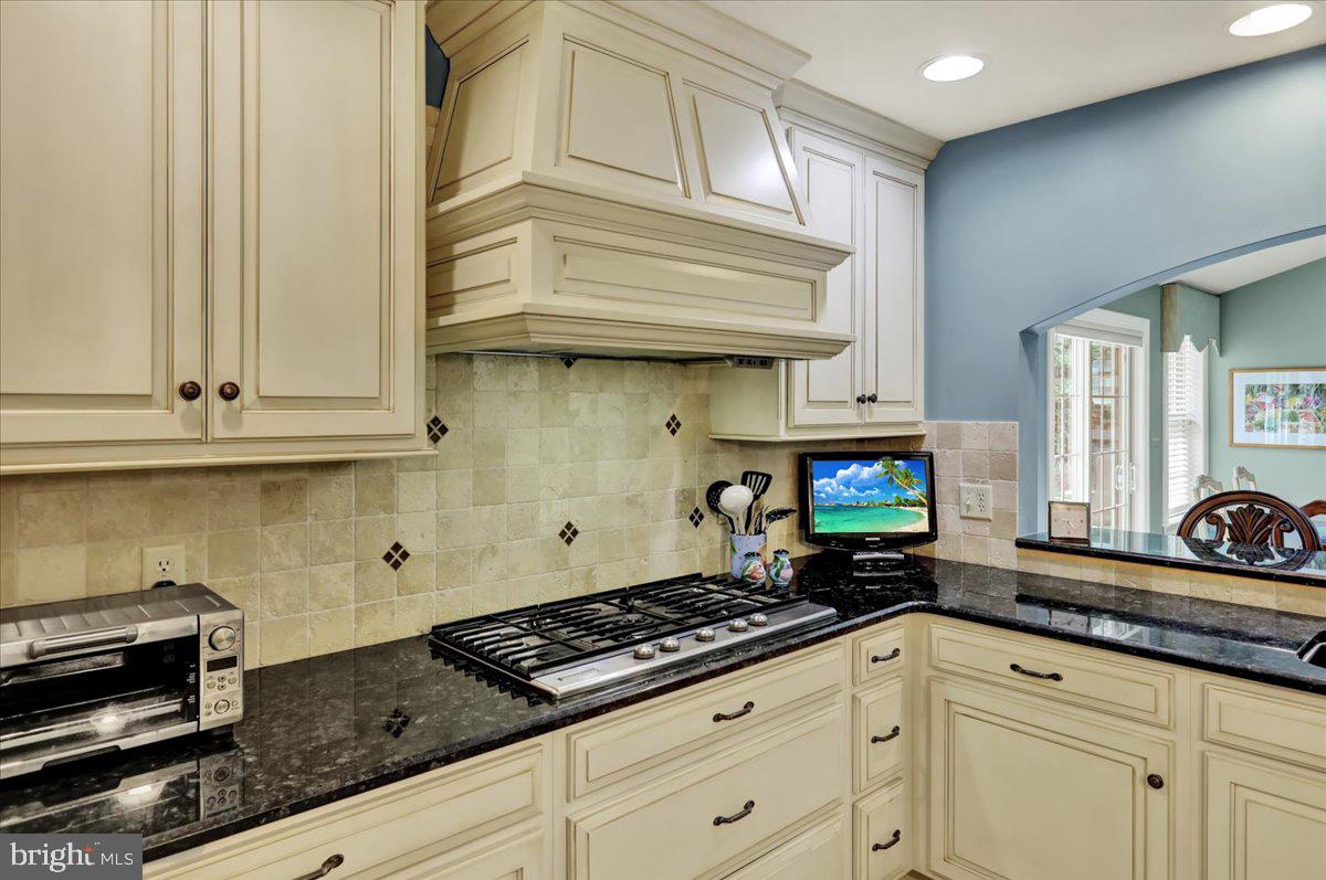 2 Cardinal Road Wyomissing, PA 19610 - Photo 17 of 51 a kitchen with stainless steel appliances granite countertop a sink a stove and cabinets