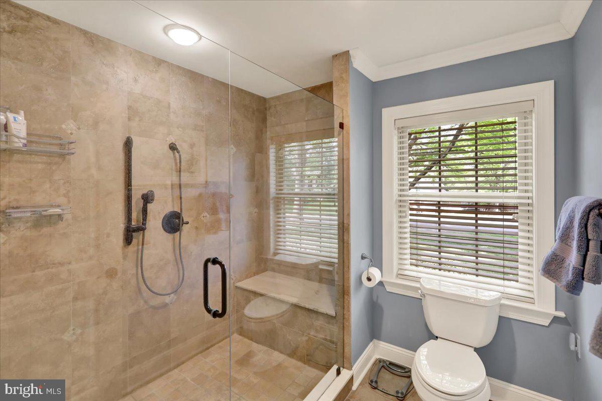 2 Cardinal Road Wyomissing, PA 19610 - Photo 28 of 51 a bathroom with a granite countertop toilet a sink and shower
