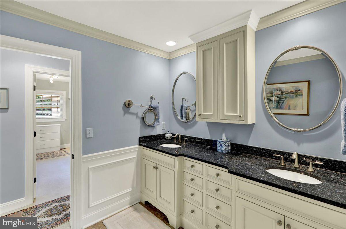 2 Cardinal Road Wyomissing, PA 19610 - Photo 29 of 51 a bathroom with a granite countertop double vanity sink and a mirror
