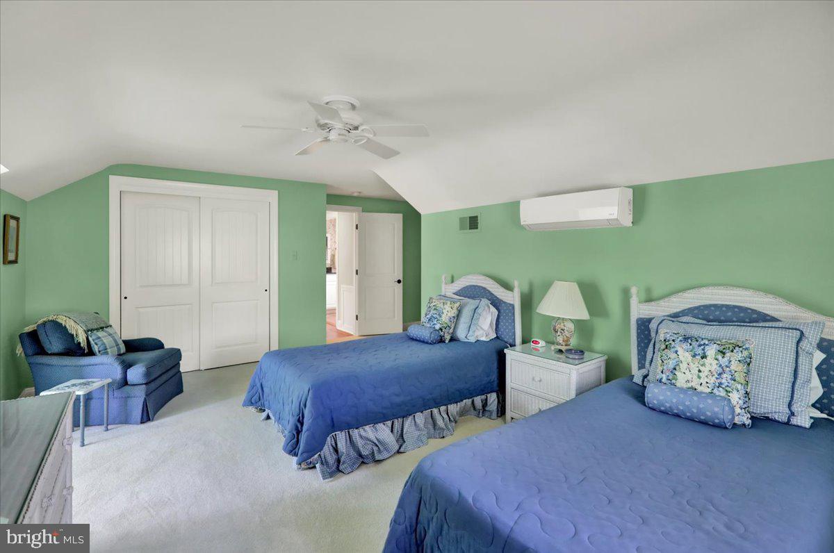 2 Cardinal Road Wyomissing, PA 19610 - Photo 36 of 51 a bedroom with two beds and painting on the wall