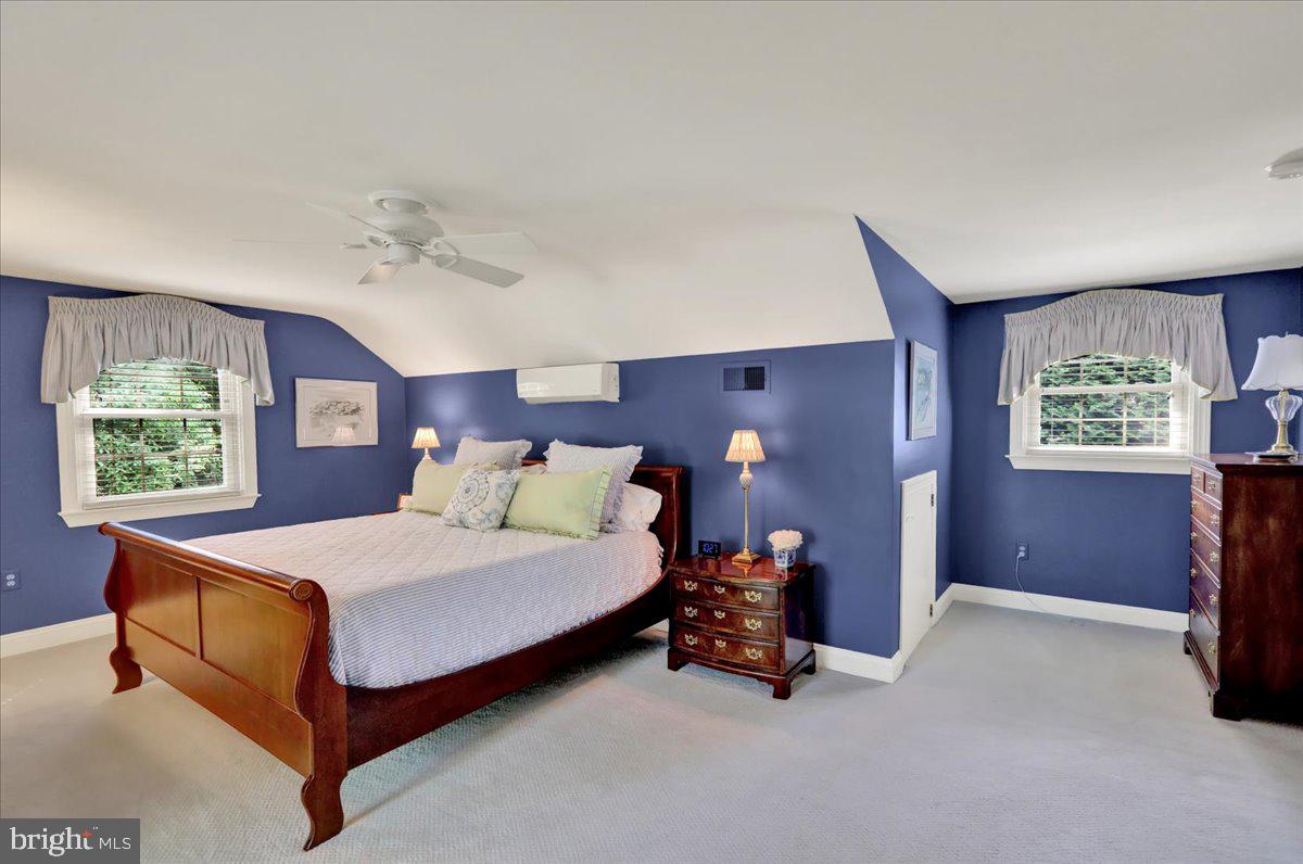 2 Cardinal Road Wyomissing, PA 19610 - Photo 41 of 51 a bed sitting in a bedroom next to a window