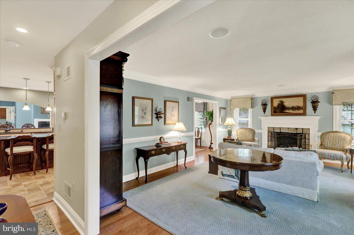 2 Cardinal Road Wyomissing, PA 19610 - Photo 6 of 51 a living room with furniture a fireplace and a table