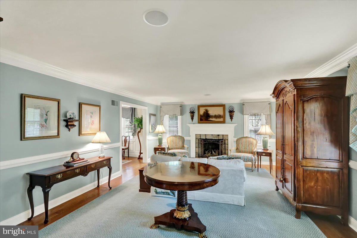 2 Cardinal Road Wyomissing, PA 19610 - Photo 7 of 51 a living room with furniture and a fireplace