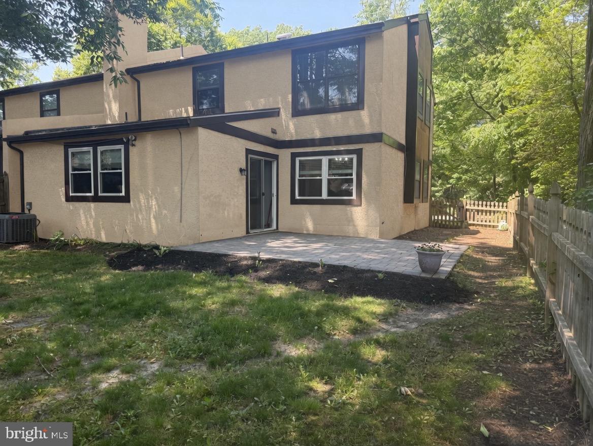 2 Goshawk Court Voorhees, NJ 08043 - Photo 26 of 33 a front view of a house with a garden