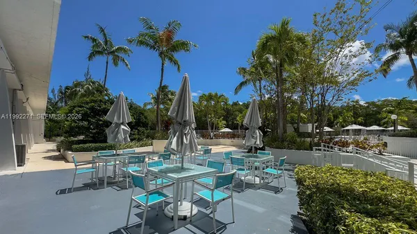 a view of a backyard with a patio