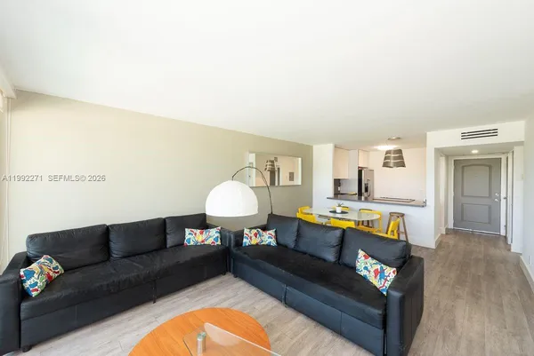 a living room with furniture and a couch