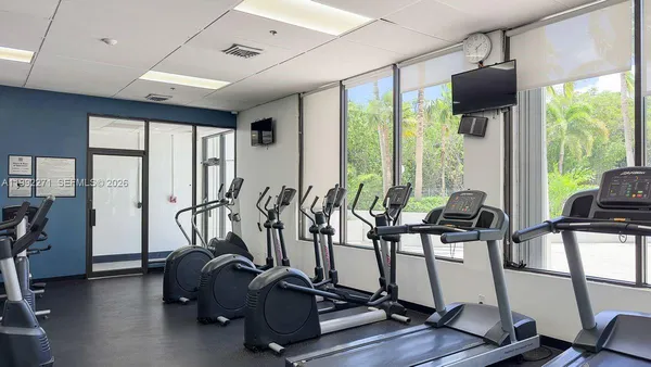 a view of a room with gym equipment