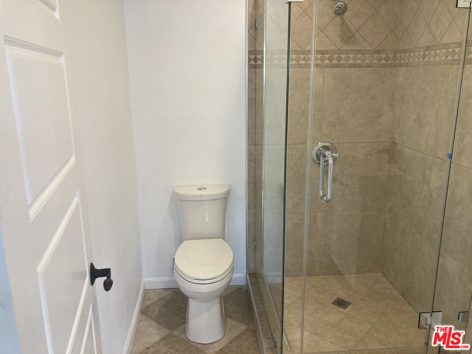 903 Arnold Drive Placentia, CA 92870 - Photo 10 of 11 a bathroom with a toilet and a shower