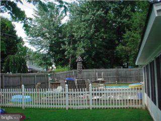 29 Fieldstone Road Levittown, PA 19056 - Photo 4 of 6 a view of house with a small yard