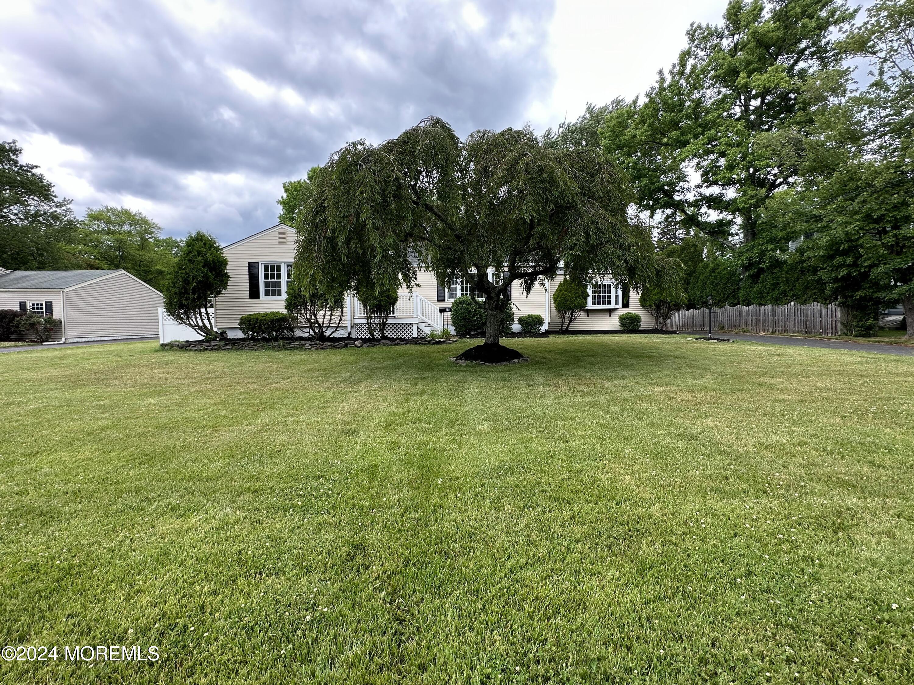57 Kings Road Little Silver, NJ 07739 - Photo 2 of 22 a view of a lake with houses