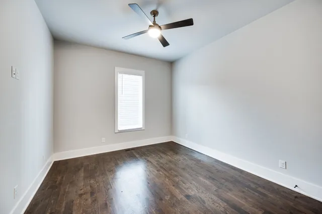 a view of an empty walk in closet