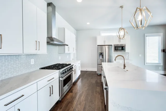 a bathroom with a sink and mirror