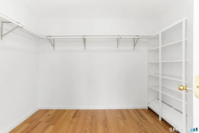 a view of a room with racks on the wall