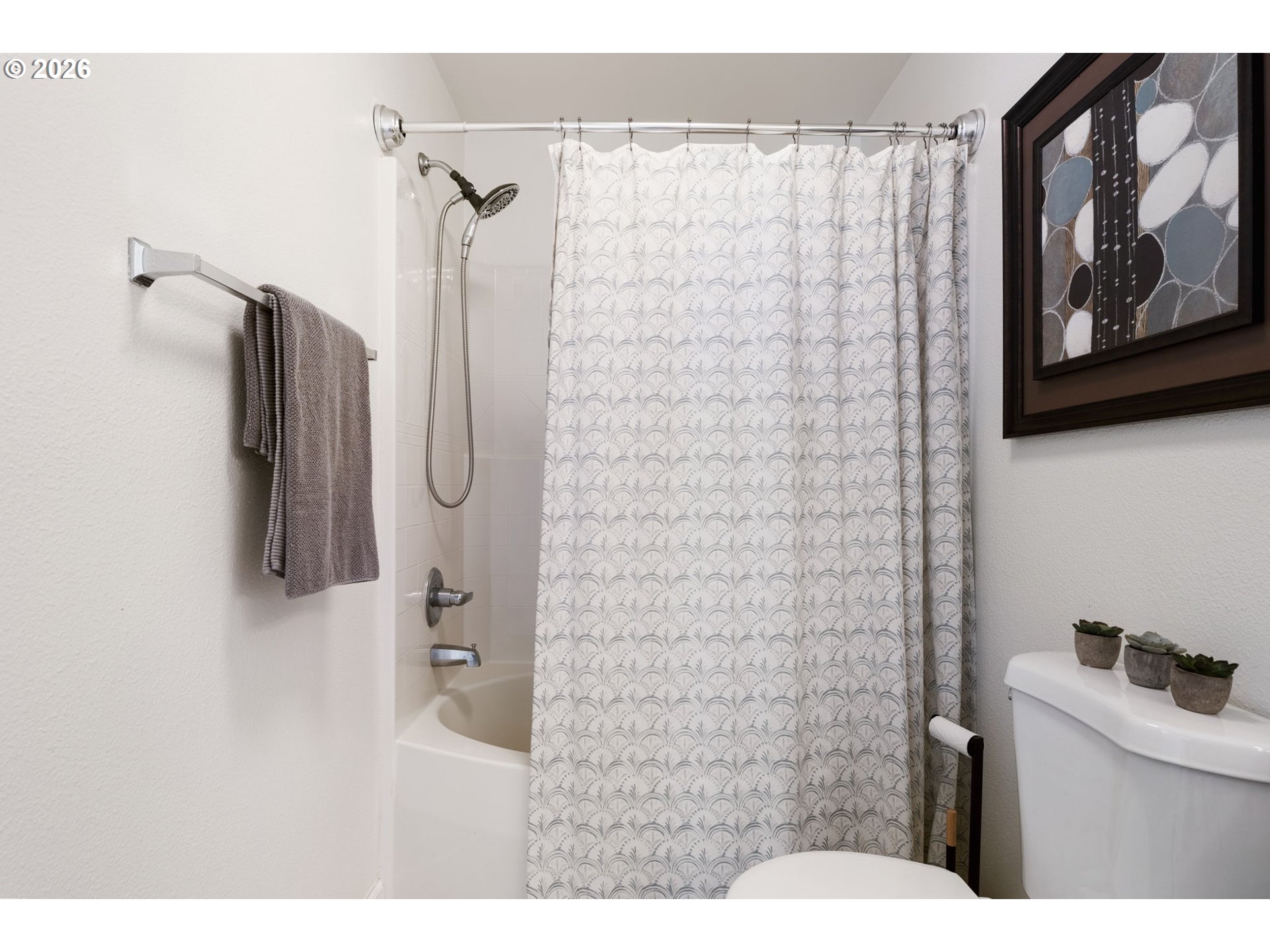 14705 Southwest Sandhill Loop, Unit 202 Beaverton, OR 97007 - Photo 16 of 24 a bathroom with a shower and a sink